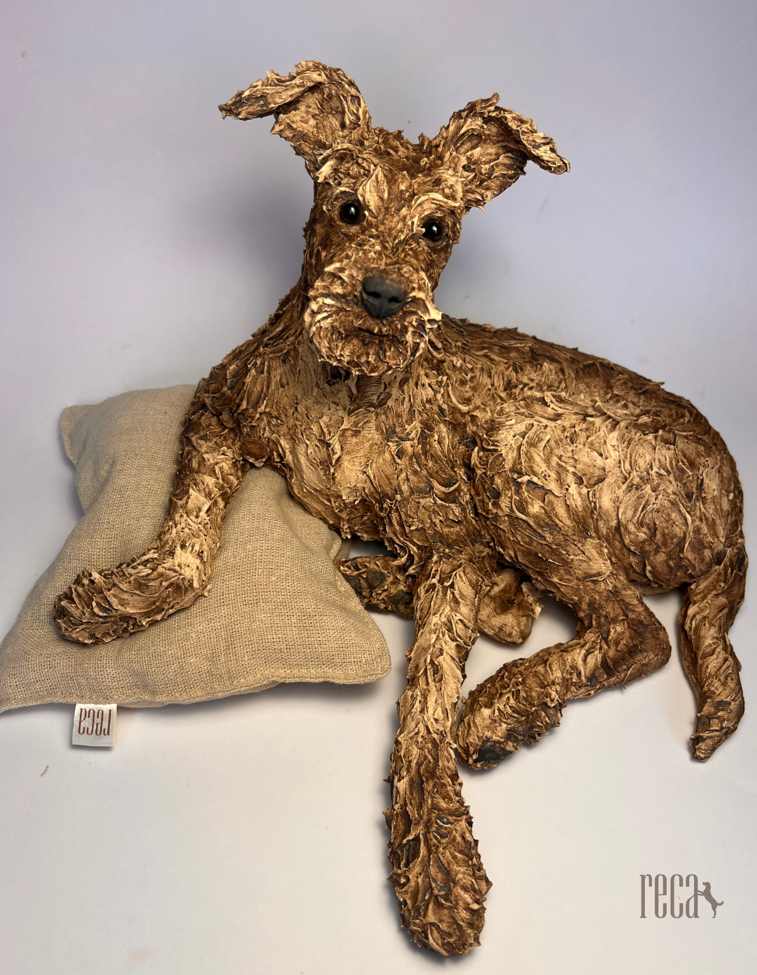 Slow Sunday – hand-sculpted terrier ceramic sculpture by RECA Ceramic